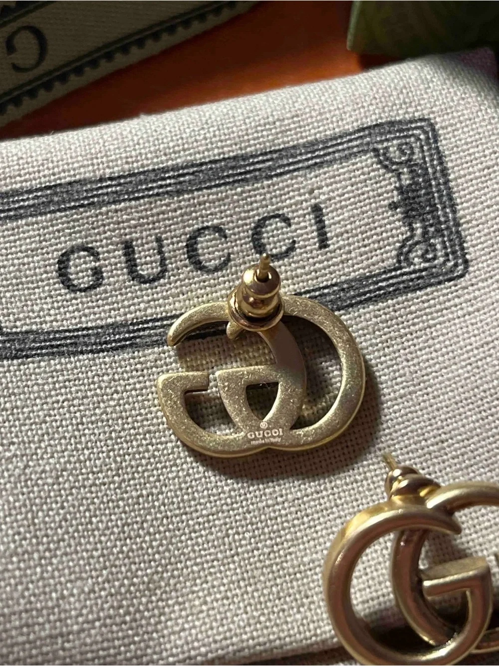 Gucci Gold tone Double G Logo Earrings with Branded Pouch